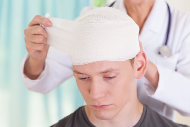 Young man with head trauma