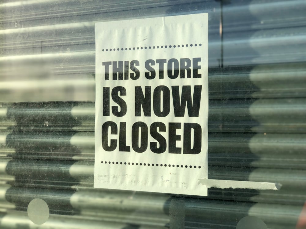 closed sign on shop shutter