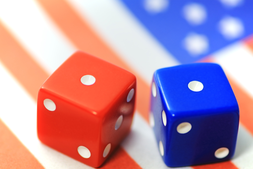 two dice against an American flag background