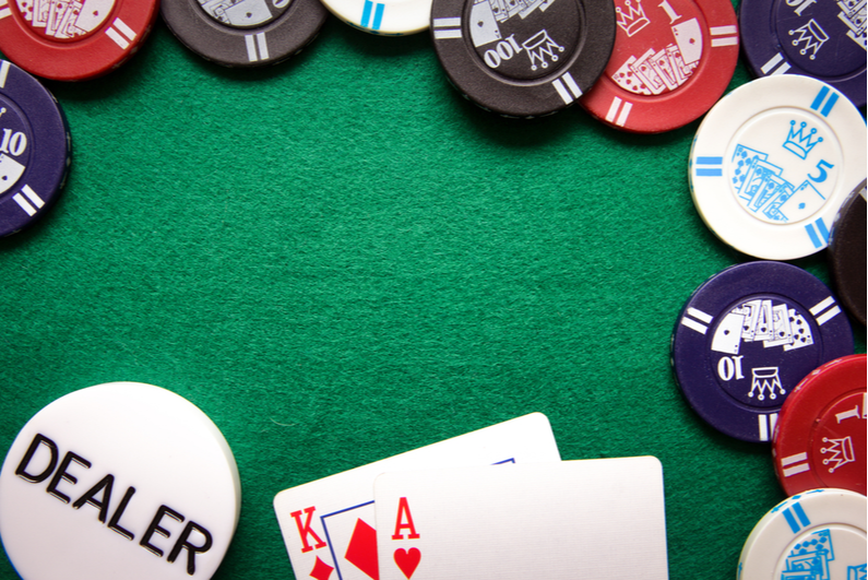 Poker chips and cards on felt